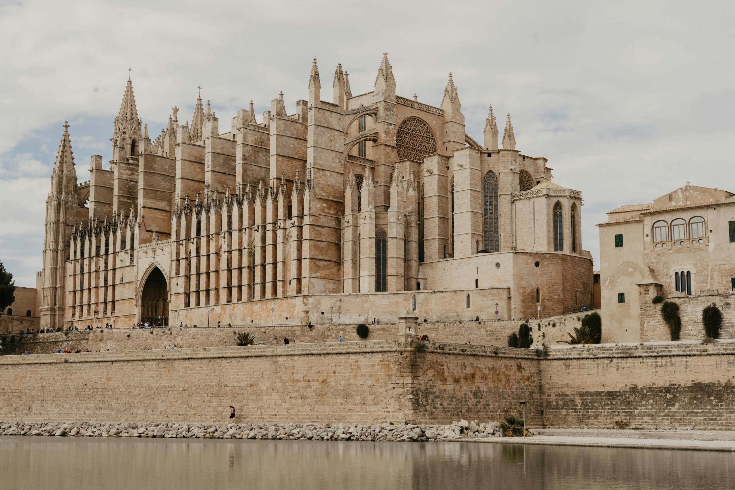 The Gothic sandstone facade and rose window of Palma Cathedral, La Seu, in Palma de Mallorca