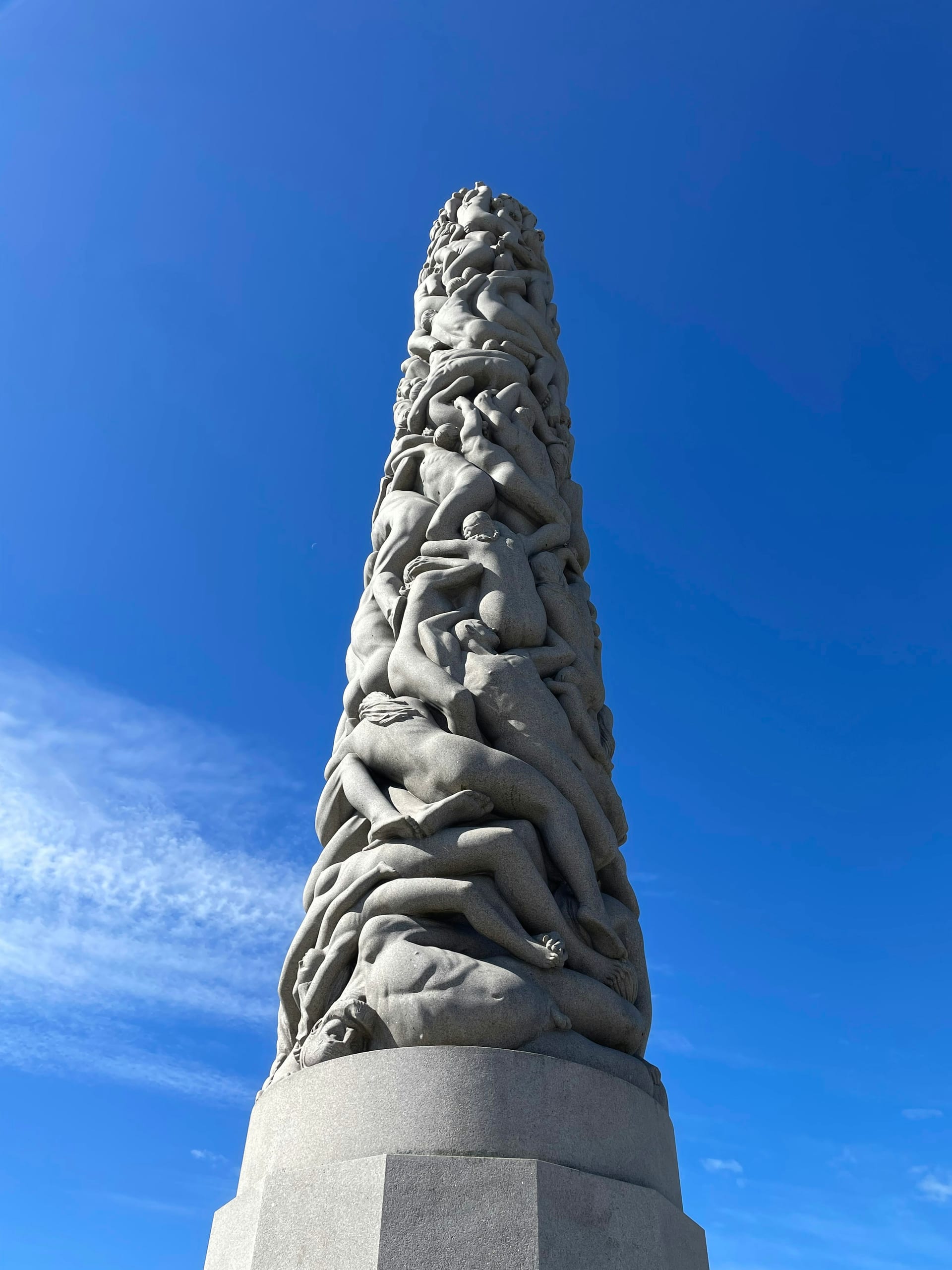 The granite Monolith at Vigeland Sculpture Park rising above concentric rings of human figures