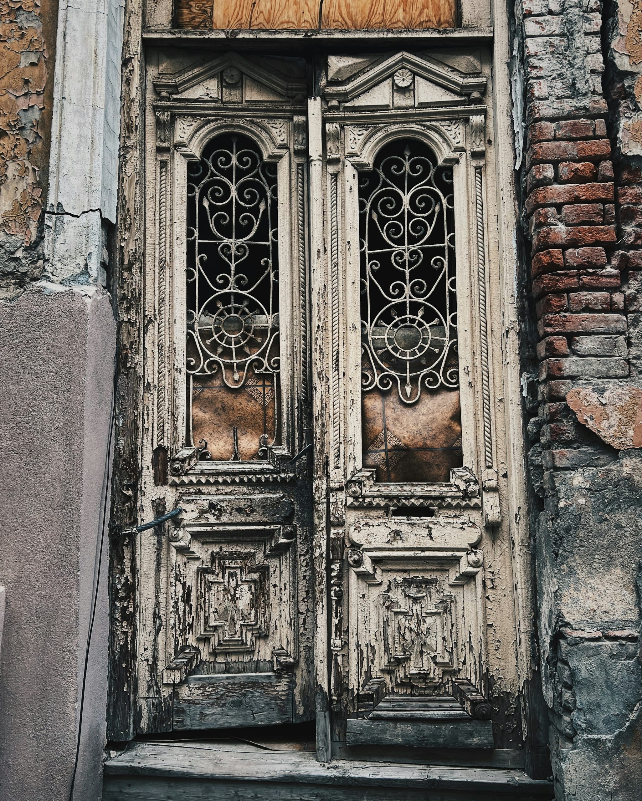 Carved wooden balconies and pastel houses stacked up the hillside of Tbilisi's old town beneath the Narikala fortress
